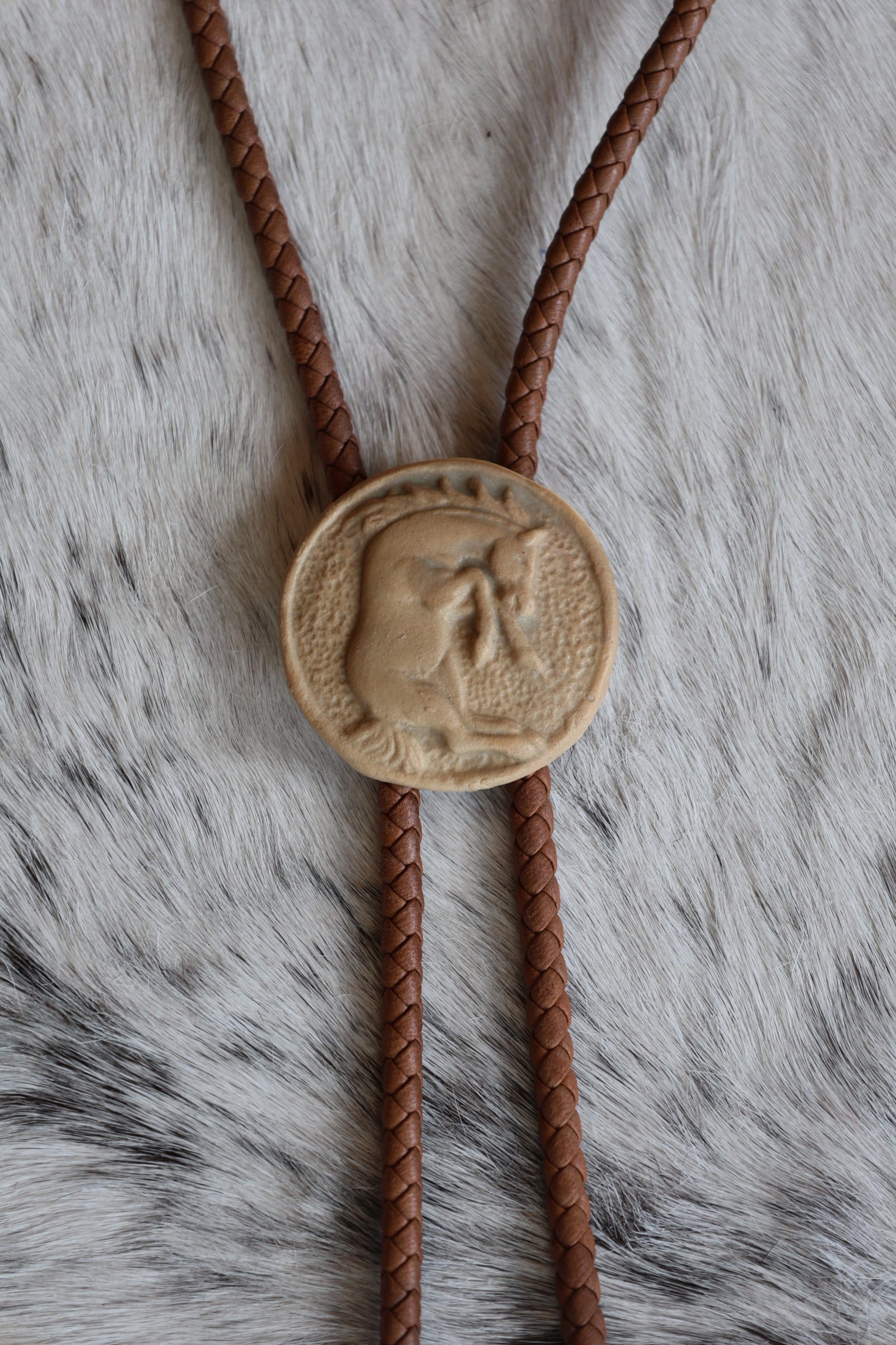 Porcelain Round Bronc Bolo